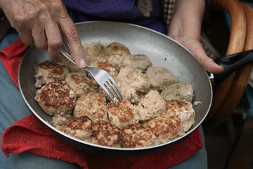 woman Eating From Pan