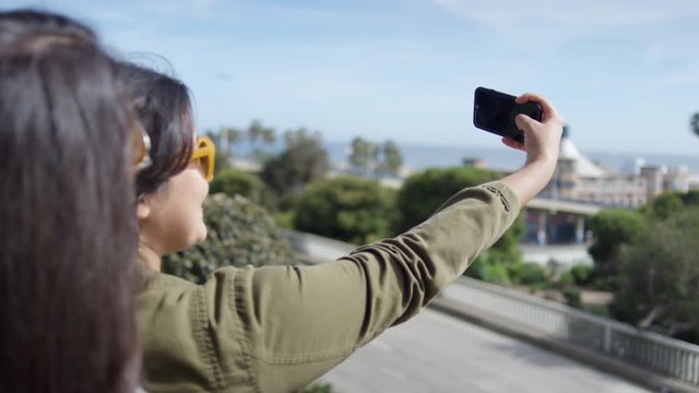 Girlfriends Take Vacation Selfies Together At An Overlook At The Santa Monica Pier, CA - Shot On Red Scarlet-W Dragon In 4K, Slow Motion