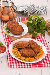 Meatballs on white dish. 