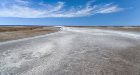 Fototapeta na wymiar Salt dry river on the lake Elton. Landscape with salt dried-up seasonal river.
