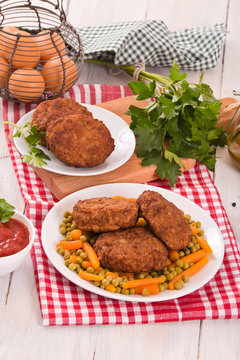 Meatballs on white dish. 