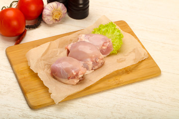 Boneless raw chicken thighs