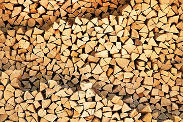 Folded firewood. Background