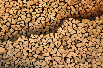 Folded firewood. Background