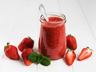 Jar with strawberry smoothie