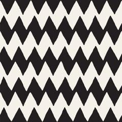 Hand drawn abstract seamless pattern in black and white. Retro grunge freehand jagged lines texture.