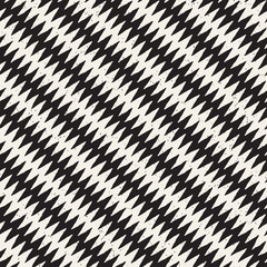 Hand drawn abstract seamless pattern in black and white. Retro grunge freehand jagged lines texture.