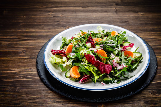Vegetable salad on wooden background