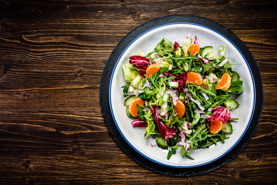 Vegetable salad on wooden background