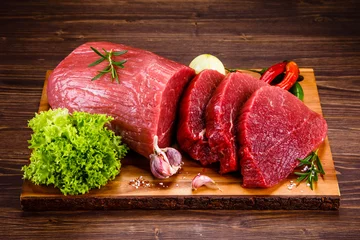 Fotobehang Vlees Fresh raw beef steaks on white background