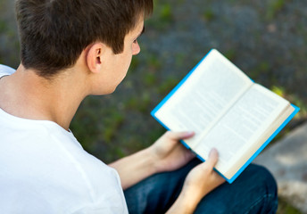 Young Man read a Book