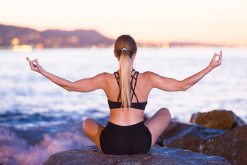 Female is meditating