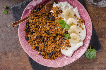 Granola baked in oven with nuts