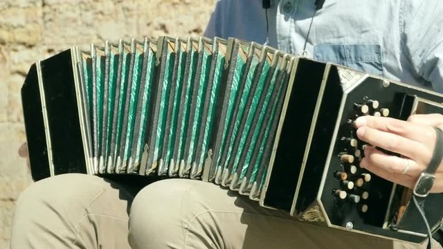 bandoneon musical instrument of the kind of hand harmonics, close to slow motion