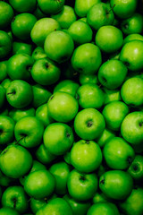 Many green ripe apples