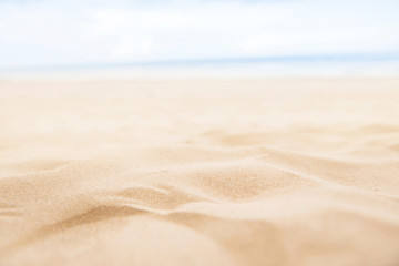 Fototapeta na wymiar Summer sand beach and sea sky background