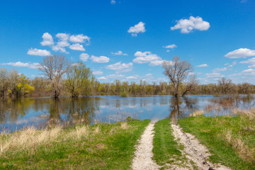 Way to nowhere. The road leading in the water. Spring flood of river Don, Russia