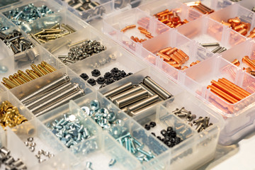 Many screws arranged as background