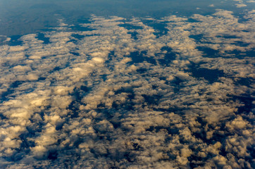 Flying above the clouds, view from the airplane