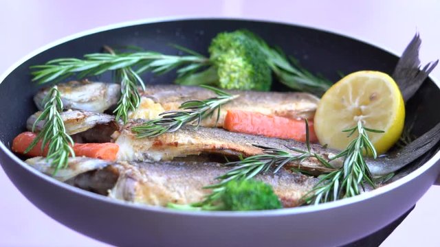 Frying Dorade Fish On A Pan 