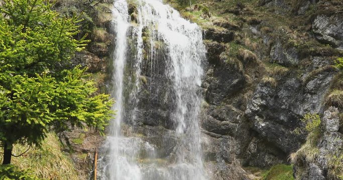 falling waterfall (Buchauer Wasserfall) - waterfall situated by the Achen lake (Achensee), Tyrol, Austria