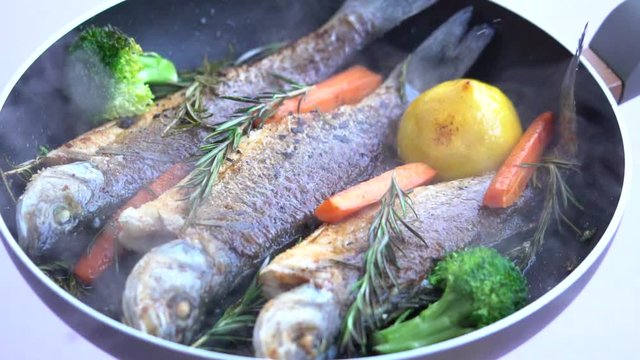 Frying Dorade Fish On A Pan 