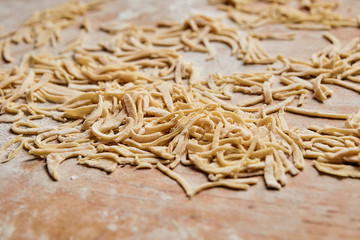 Making homemade linguine pasta with farm fresh produce.