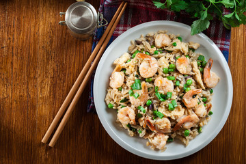 Fried rice with shrimp and vegetables served on a plate