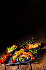 grilled krakauer with french fries and green salad
