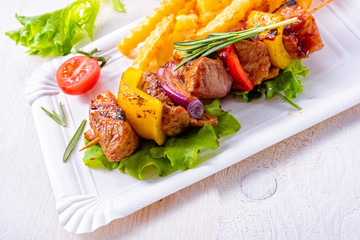 shish kebab skewers with marinated ham meat paprika and red onion