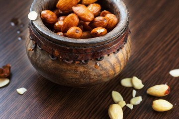 Almonds in wooden bowl.