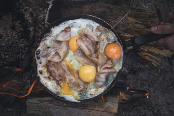 fried eggs at the stake for tourists. Breakfast outside in the open air