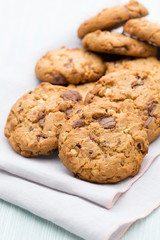 Chocolate oatmeal cookies on the  wooden background.
