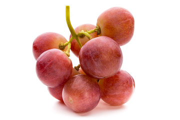 Ripe red grape isolated on white.