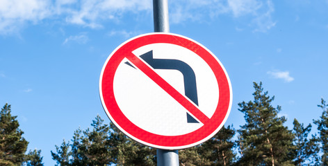 Traffic sign do not turn left 	