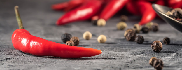 Red hot chilli pepper paprika in and peppers seed ball on stone table Ingredient for Mexican cooking, Trendy toned image in minimal rustic style - 206687958