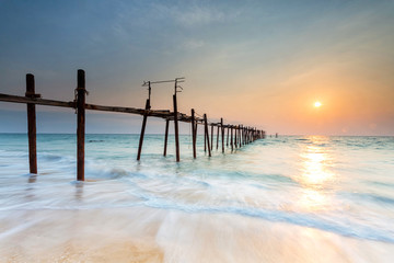 Wooden bridge on the beach at sunset,Phuket,Thailand.