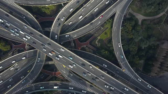 Aerial Top epic multilevel Road traffic Junction Shanghai China Overpass complicated urban transportation cars interchange complex Technology unique modern technological construction urban. Drone