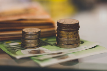 Cash, pyramids of coins, paper money, metal money.