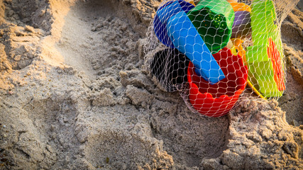 colorful beach toys on the beach