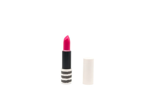 Pink lipstick isolated on white background