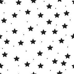 Scandinavian seamless pattern. Ornament with stars and dots.