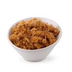 Dried shredded pork in a white bowl isolated on a white background