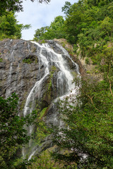 Fototapeta na wymiar Khlong Lan Waterfall, Beautiful waterfalls in khlong Lan national park of Thailand at KamphaengPhet Province in Thailand.