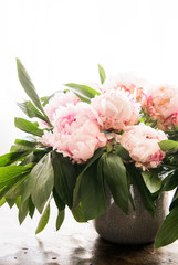 bouquet of fresh pink peony flowers as a wedding decoration 