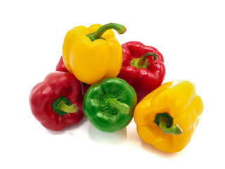 Fresh vegetables, red, yellow, green sweet peppers on white background.