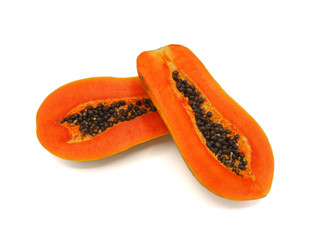 Fresh sliced half papaya isolated on white background.