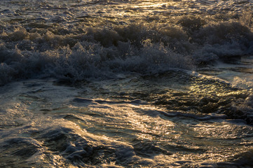 Amazing sea sunset, the sun, waves, clouds