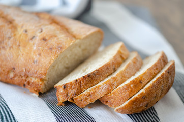 Fresh bread slices on the table