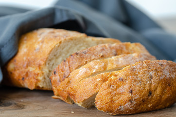 Fresh bread slices on the table (shallow depth of field